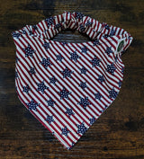 American flag patterned bandana on a wooden surface