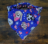 Fabric with dog-themed design on a wooden surface