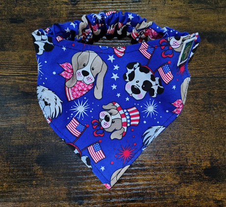 Fabric with dog-themed design on a wooden surface