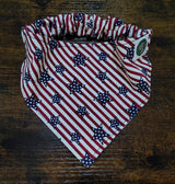 Folded fabric with American flag pattern on a wooden surface
